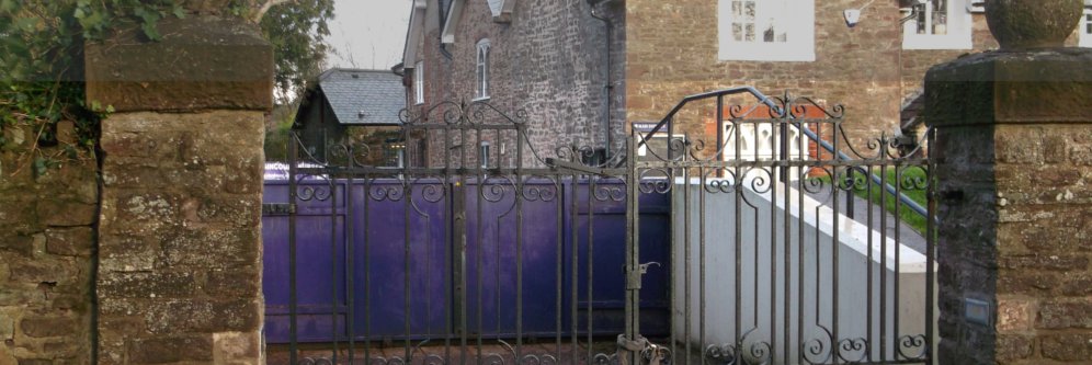 Photograph - Flood gates in the closed position 
to protect a property in south Wales from flooding.